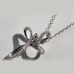 Load image into Gallery viewer, 1/4 Carat Twisted Cross Pendant With Lab Diamond
